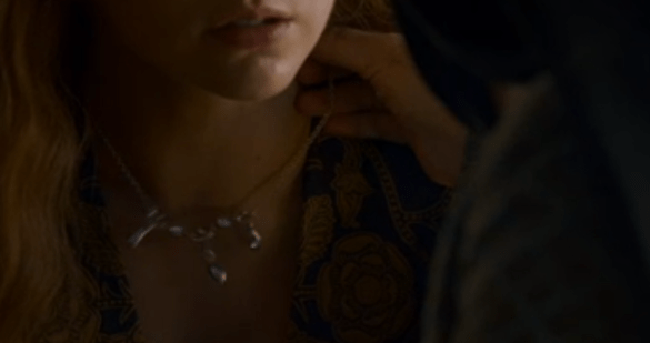 Lady Olenna rearranging Margaery's necklace as she admits to her role in Joffrey's death