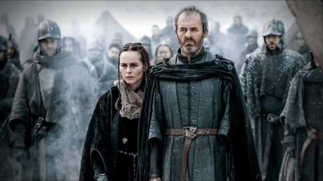 Stannis and his wife look on as their daughter burns